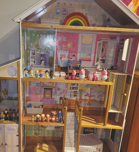 Massive dolls house with 2-3 sets of role play characters