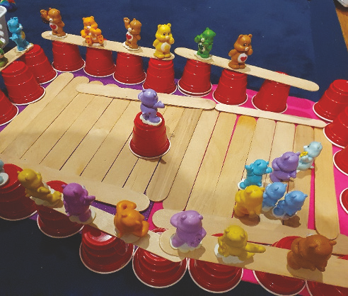 Care Bear Miniture Figurine play set  with play construction extras for 4  students.