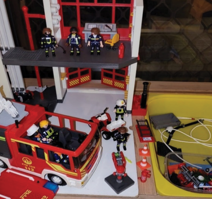 Fire Station and Fire Engine plus characters and loads of accessories. Plus 3 fire fighter hats