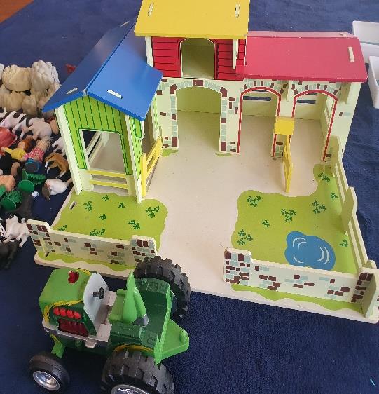 FARMYARD wooden set  With loads of farm animals and tractor.