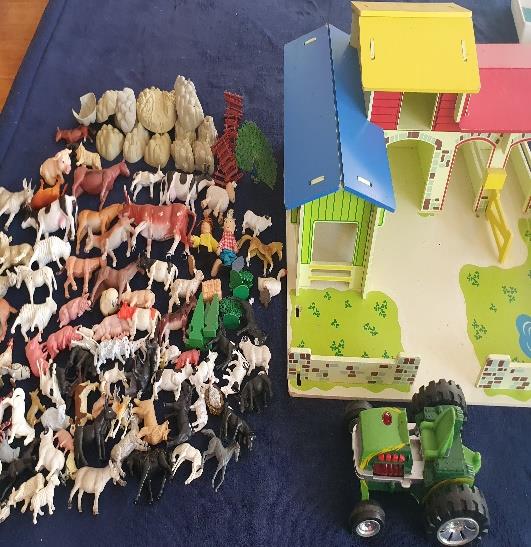 FARMYARD wooden set  With loads of farm animals and tractor.