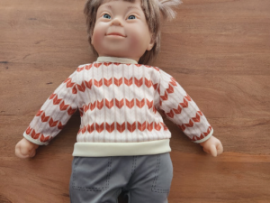 boy doll with down syndrome for home corner integration play.webp